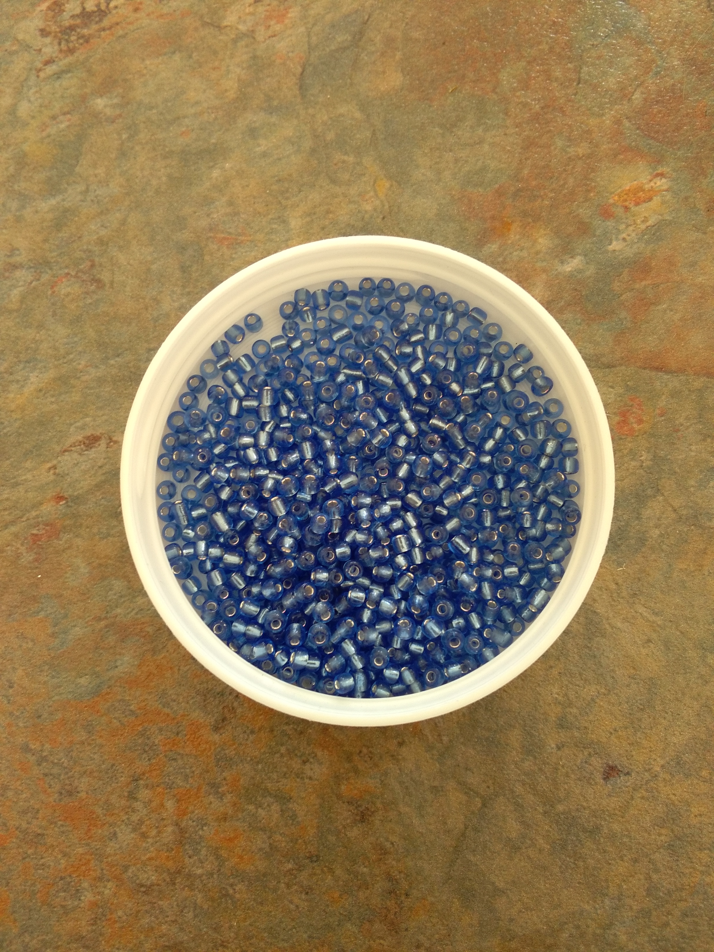 Silver Lined Ceylonese Blue 8/0 Seed Beads